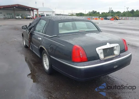 2000 Lincoln Town Car Executive из США, поврежденный, VIN 1LNHM81WXYY808762